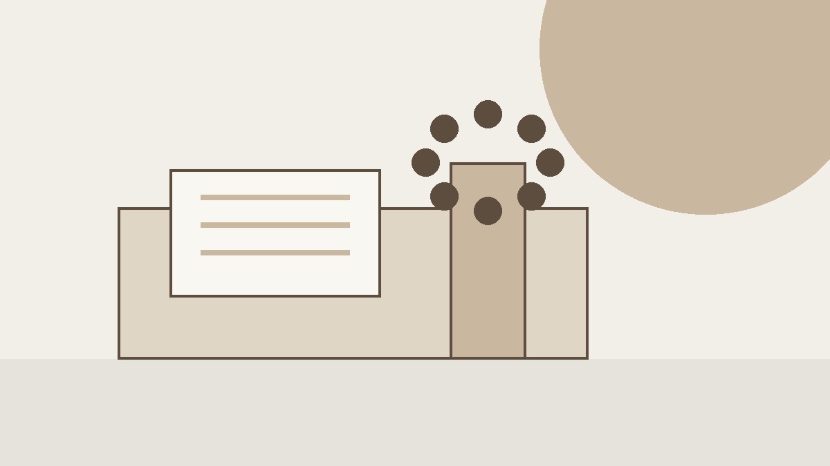Minimal desk scene with an envelope and writing tools