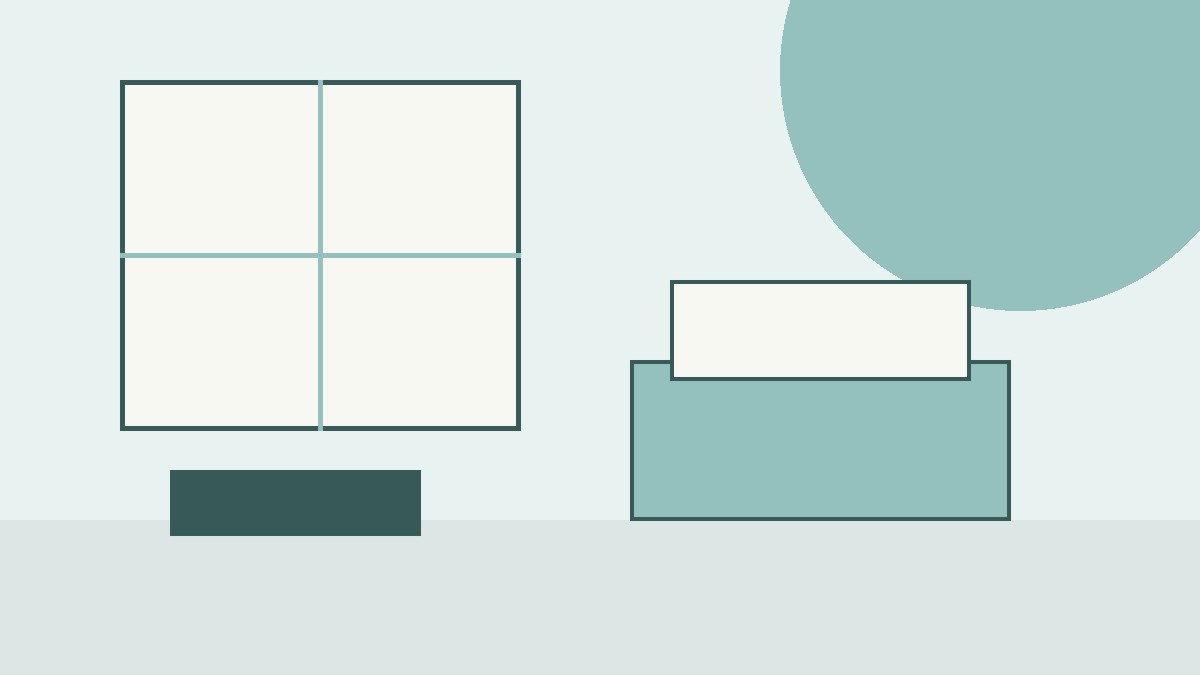 Bright compact room with open floor space and simple furniture